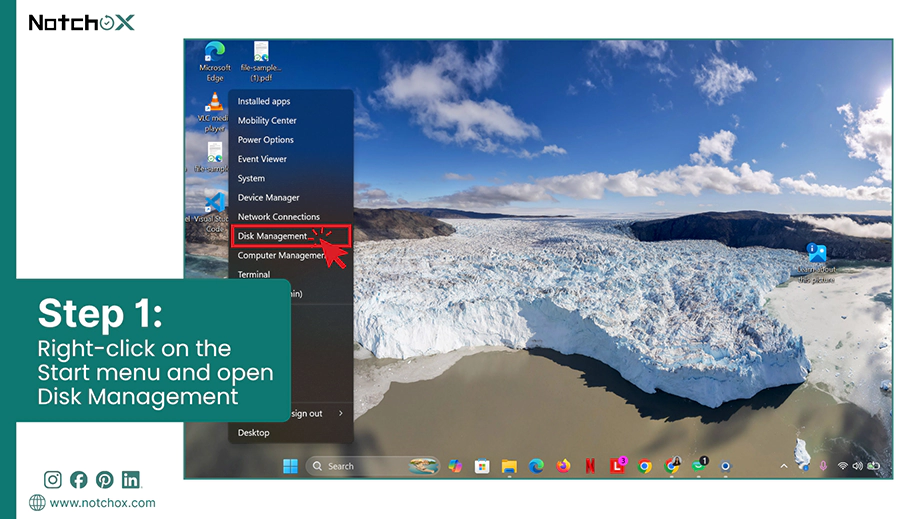 Right click on the Start menu and open Disk Management