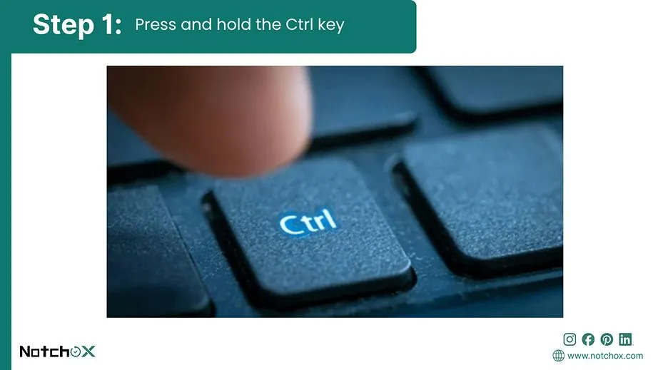 Press and hold the Ctrl key