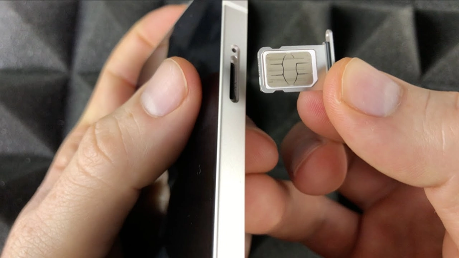 Insert SIM on iPhone